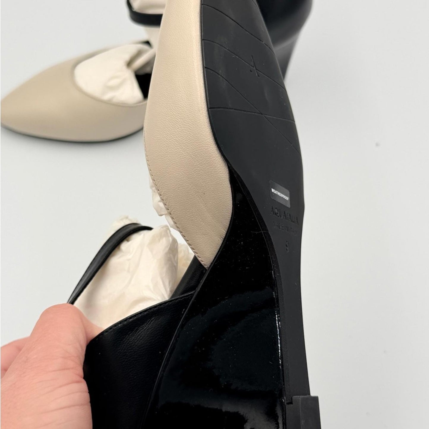 Aquatalia Black and Cream Wedges